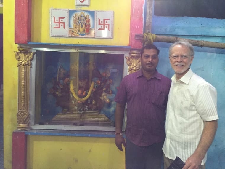 Indian man with idol - luck
